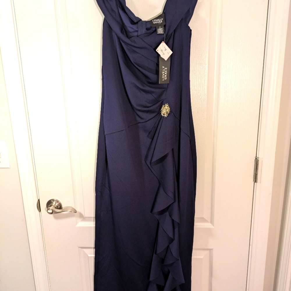 Lovely Grace Dress in Deep Blue with Ruffle and Brooch.